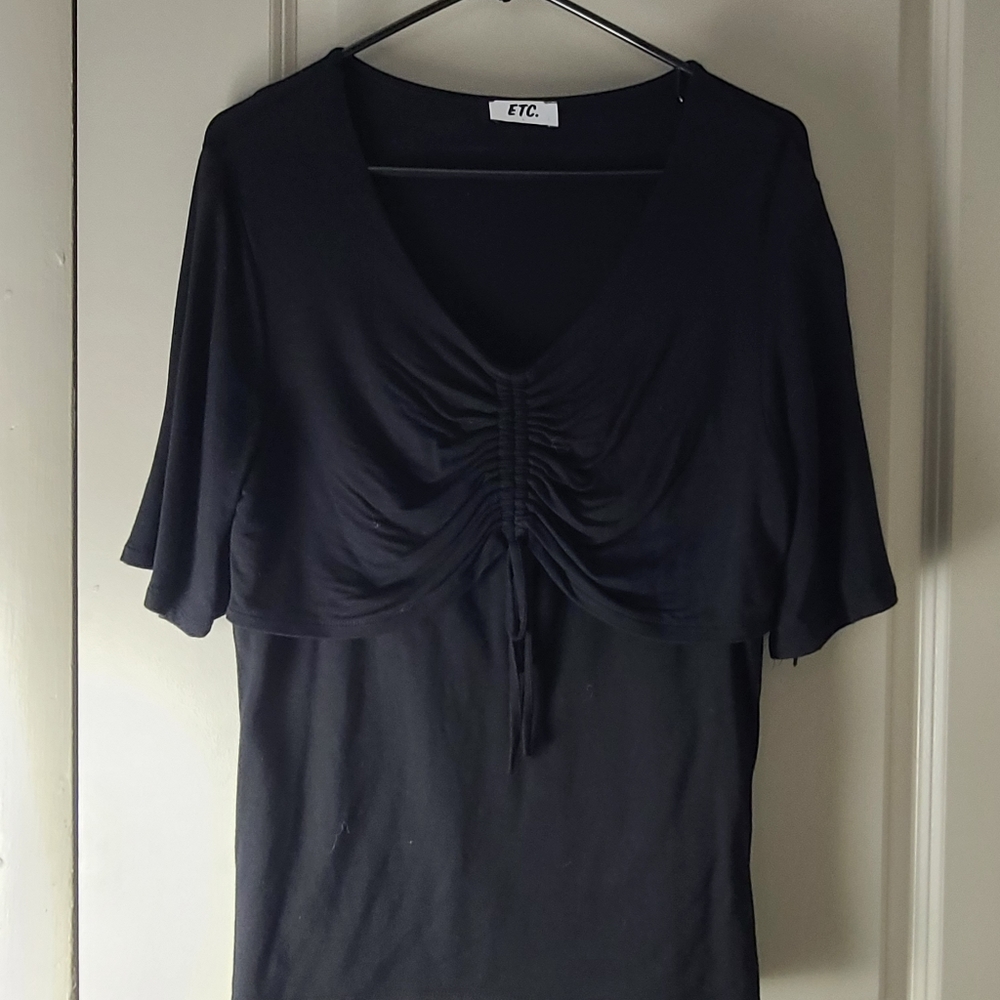 Black cinched flowy top with